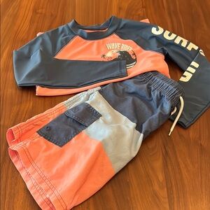 Oshkosh rashguard and swim trunks